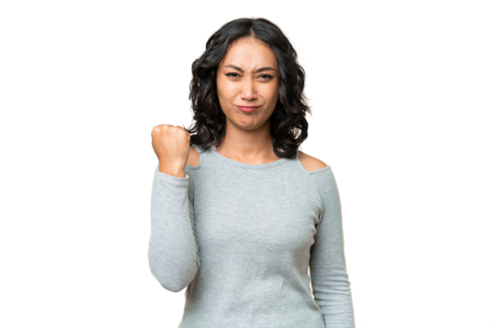 Young Argentinian woman over isolated background with unhappy expression