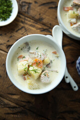 Traditional fish soup with vegetables and cream