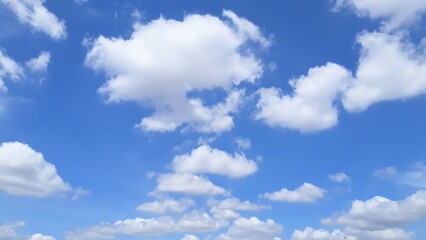 Naklejka na ściany i meble blue sky with white clouds on a sunny day