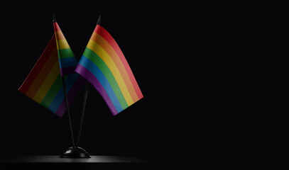 Small national flags of the lgbt on a black background