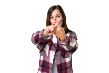 Middle age woman over isolated chroma key background making stop gesture with her hand to stop an act