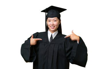 Young university graduate Asian woman over isolated background proud and self-satisfied