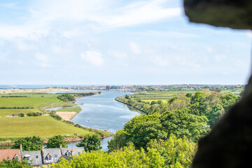 Views from Warkworth Castle in Northumberland, UK, looking towards River Coquet and Amble coast