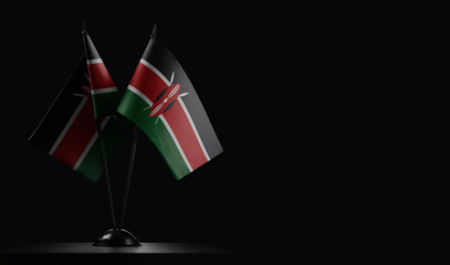 Small national flags of the Kenya on a black background