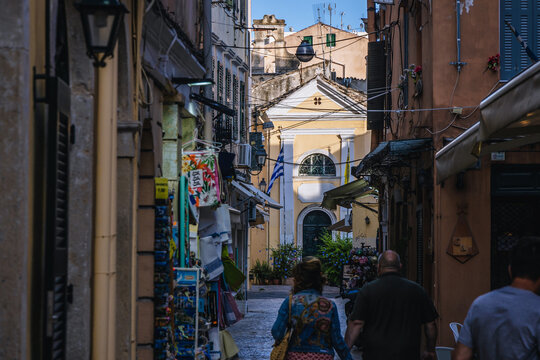 Fototapeta Church seen from narrow street in historic part of Corfu city, Corfu Island, Greece