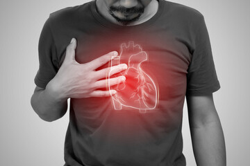 Arrhythmia of asian man on a gray background.