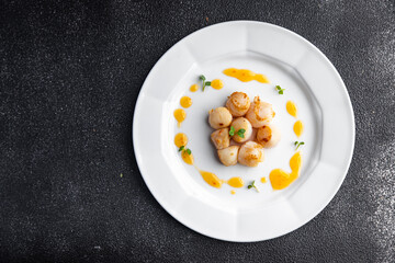 sea scallop fresh seafood fried meal food snack on the table copy space food background rustic top view