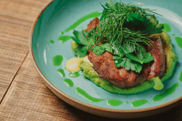Modern restaurant fresh dish lies on a wooden table in a restaurant