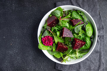beet salad fresh beetroot slice mix green lettuce healthy meal food snack on the table copy space...