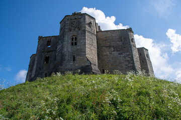 Fototapeta na wymiar Warkworth Castle on top of hill mound. Northumberland, UK