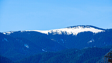 A landscape photo of some snowy mountains.