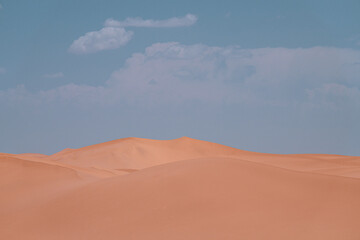 sand dunes and clouds