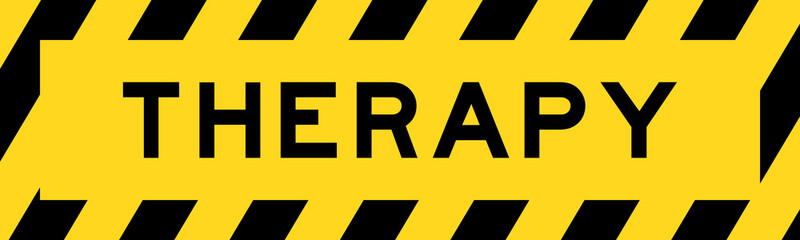 Obraz premium Yellow and black color with line striped label banner with word therapy