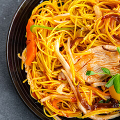 noodles chicken and vegetables healthy meal food snack on the table copy space food background rustic top view