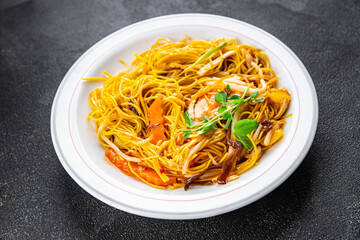 noodles chicken and vegetables healthy meal food snack on the table copy space food background rustic top view