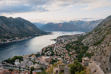 Fototapeta na wymiar Amazing panoramic aerial view before sunset of Kotor bay from city walls and fortress, soft colours, Montenegro 