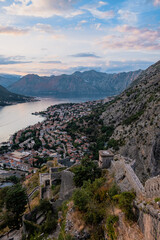 Fototapeta na wymiar Amazing panoramic aerial view at sunset of Kotor bay from Kotor city walls and fortress, soft colours, Montenegro 