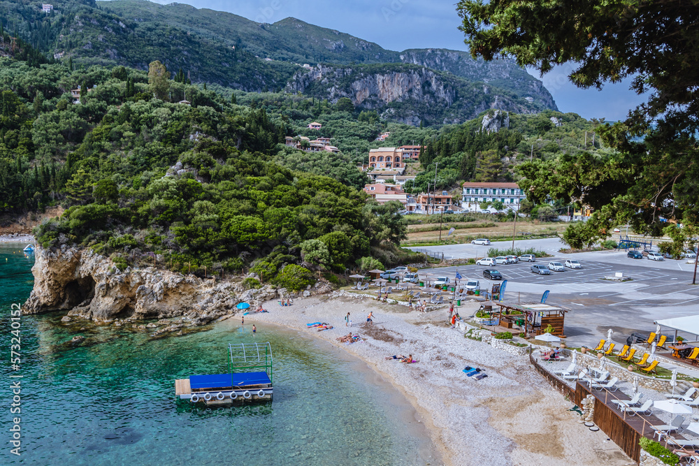 Poster Agios Petros beach in Ampelaki Ionian Sea Bay in Palaiokastritsa village, Corfu Island, Greece