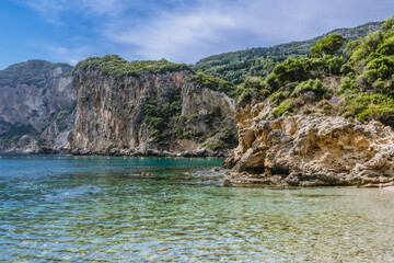 View from Agios Petros beach in Palaiokastritsa village, Corfu Island, Greece - obrazy, fototapety, plakaty