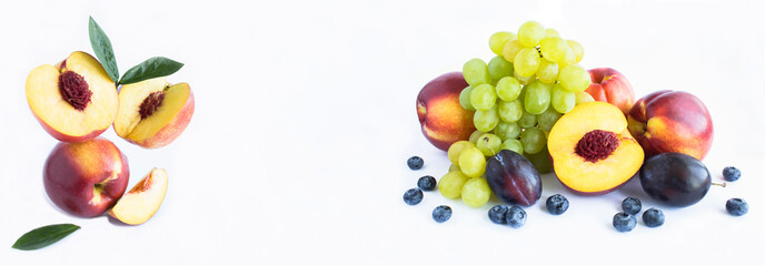 Balance of nectarines, fruit and berry on the white background. Copy space. Banner.