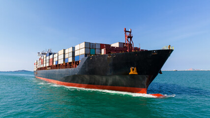 cargo container ship sailing in sea to import export goods and distributing products to dealer and...