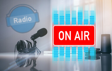 Desk with microphone, headphones and computer. Web radio, communication entertainment on air concept