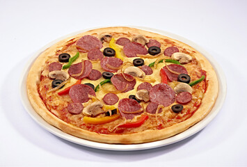 Pizza pepperoni, mushroom, and vegetables on white dish and isolated background