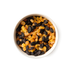 White and dark raisins in a bowl top view on a white background.