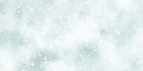Abstract light blur defocused blue background with bokeh, Beautiful winter background of snow floating into air randomly, light blue bokeh background for wallpaper, invitation, cover and design.	