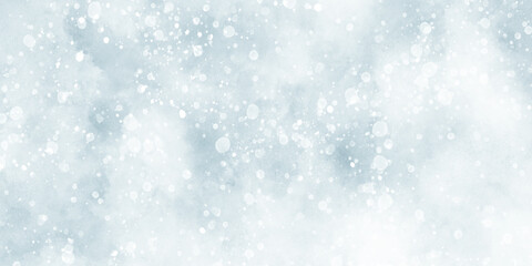 Abstract light blur defocused blue background with bokeh, Beautiful winter background of snow floating into air randomly, light blue bokeh background for wallpaper, invitation, cover and design.	