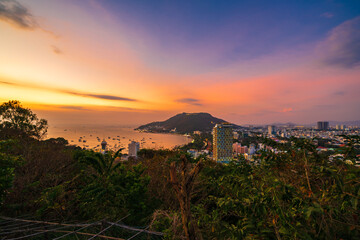 Vung Tau city aerial view at night with the most beautiful sea waves, coastline. Vung Tau is the capital of the province since the province's founding and is the crude oil extraction center of Vietnam