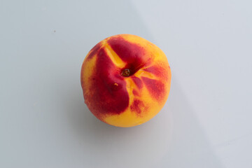A PEACH IN OVERHEAD VIEW
