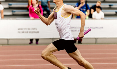 Fototapeta premium male athlete runner run relay race run