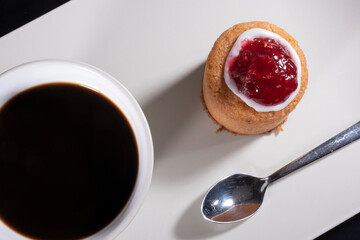 Traditional Finnish cuisine - Runeberg torte is named after the Finnish national poet Johan Ludvig Runeberg. Flavored with almonds and arrack, the torte traditionally has a raspberry topping.