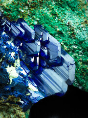 Blue azurite crystal on malachite matrix. macro detail texture background. close-up raw rough...