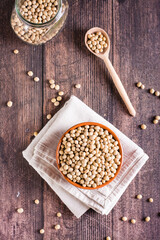 Ripe soybeans in a bowl and spoon. Vegetable protein and antioxidant. Top and vertical view