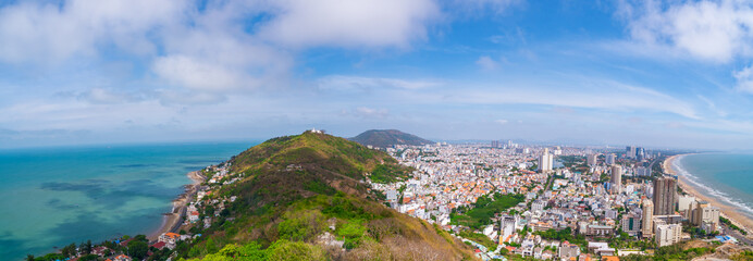 Vung Tau is a famous coastal city in the South of Vietnam. Vung Tau city aerial view in the...