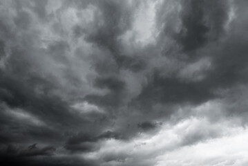 dark clouds make sky in black. Heavy rain thunderstorm . Pattern of clouds overcast predict tornado, Hurricane or thunderstorm and rainy.