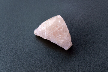 Natural mineral crystal of rose quartz gemstone. Natural rose quartz crystal.