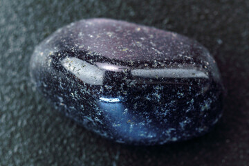 Natural mineral rock specimen polished black Onyx gemstone close up macro