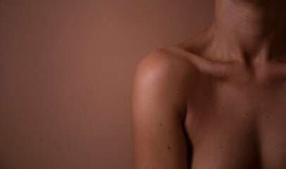 Sexy neck woman. Sensual. portrait of a woman. Erotica. Shadow. Body. Background. 