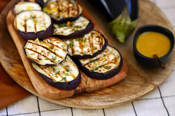 Grilled eggplant with mustard sauce.