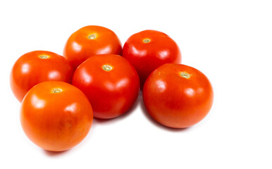 Delicious red Tomatoes. Isolated on white background.