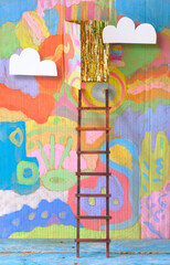 creativity,solution,innovation,idea,thinking out of the box concept, painted wall with ladder of success leading to a door