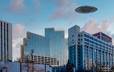 Zelfklevend Fotobehang UFO spacecraft hovering above hotels in Reno, Nevada © gchapel