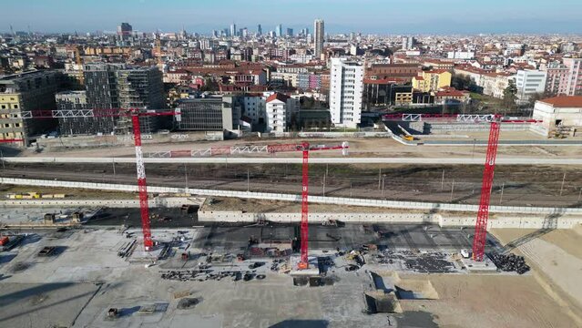 EUROPE, ITALY, MILAN 2023 - Drone aerial view of Scalo Porta Romana, building construction of Olympic Village for Milan-Cortina 2026 Winter Olympics games in downtown of the city near Prada Tower  