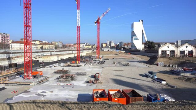 EUROPE, ITALY, MILAN 2023 - Drone aerial view of Scalo Porta Romana, building construction of Olympic Village for Milan-Cortina 2026 Winter Olympics games in downtown of the city near Prada Tower  