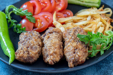 Turkish style meatballs. Turkish cuisine delicacies. Meatballs fried in breadcrumbs. local name Kadin Budu Kofte or Women's Leg Meatballs. 