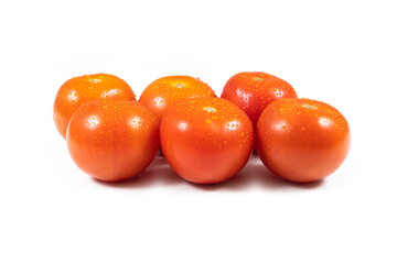 Six ripe and red Tomatoes with droplets of dew. Isolated on white background.