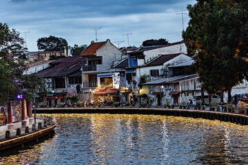Fototapeta na wymiar Night view of cafes by the river in Melaka old town Malaysia